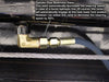 Atlas Garage PRO8000EXT 4-Post Lift close-up view of cylinder flow restrictor valve